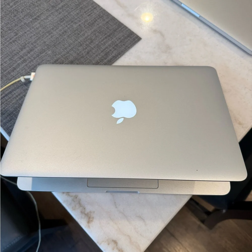 Apple Silver MacBook Pro with Black Keyboard